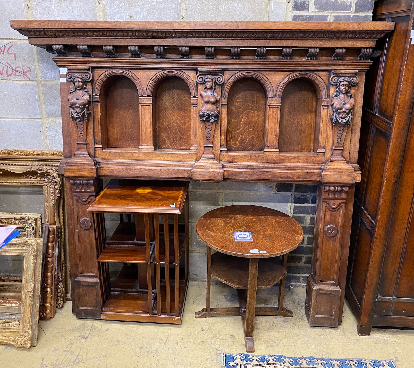 An 18th century style carved oak fire surround, width 190cm, depth 25cm, height 168cm